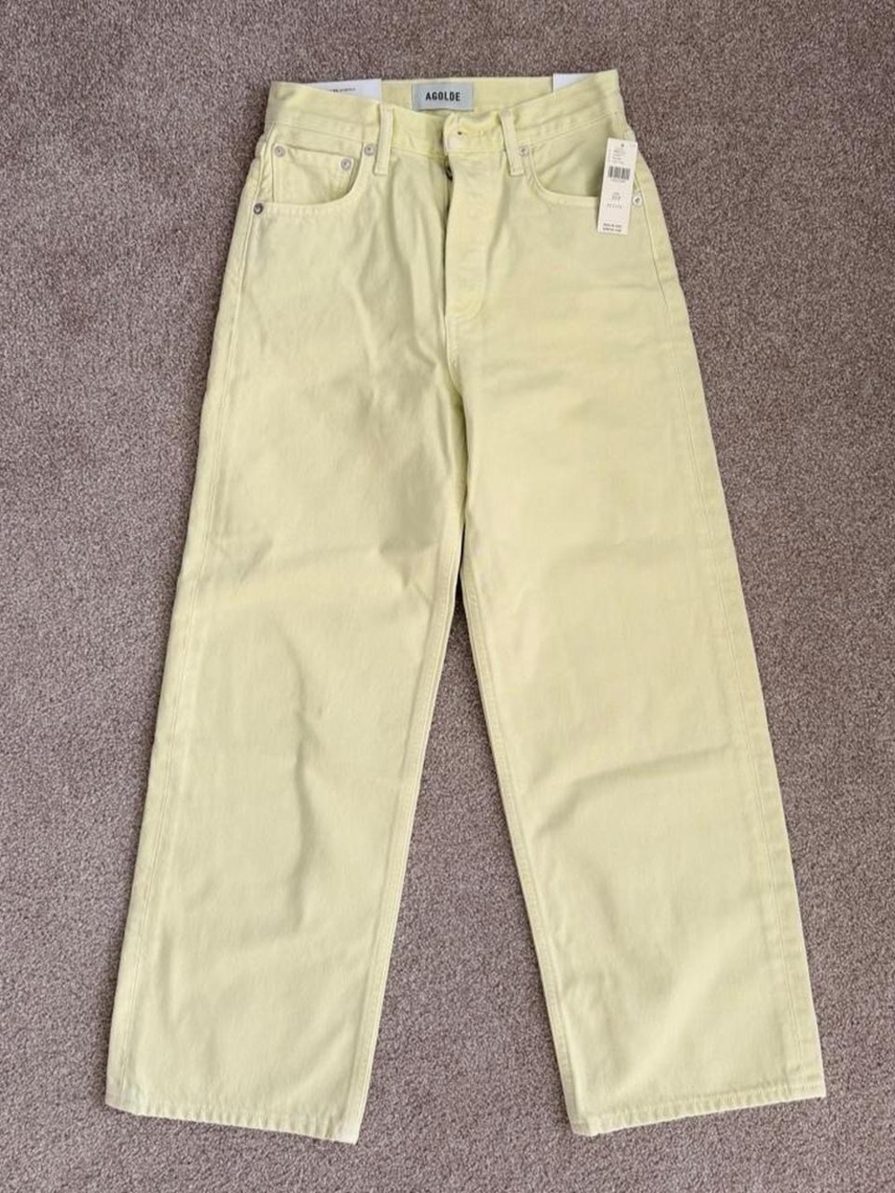 AGOLDE Arc High Rise Tapered Jeans in Lemon Zest